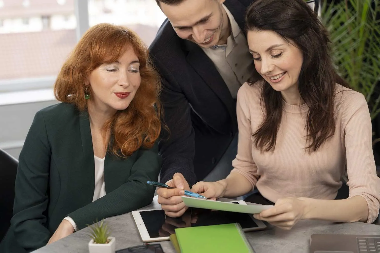 Person reviewing unpaid invoices on a laptop
